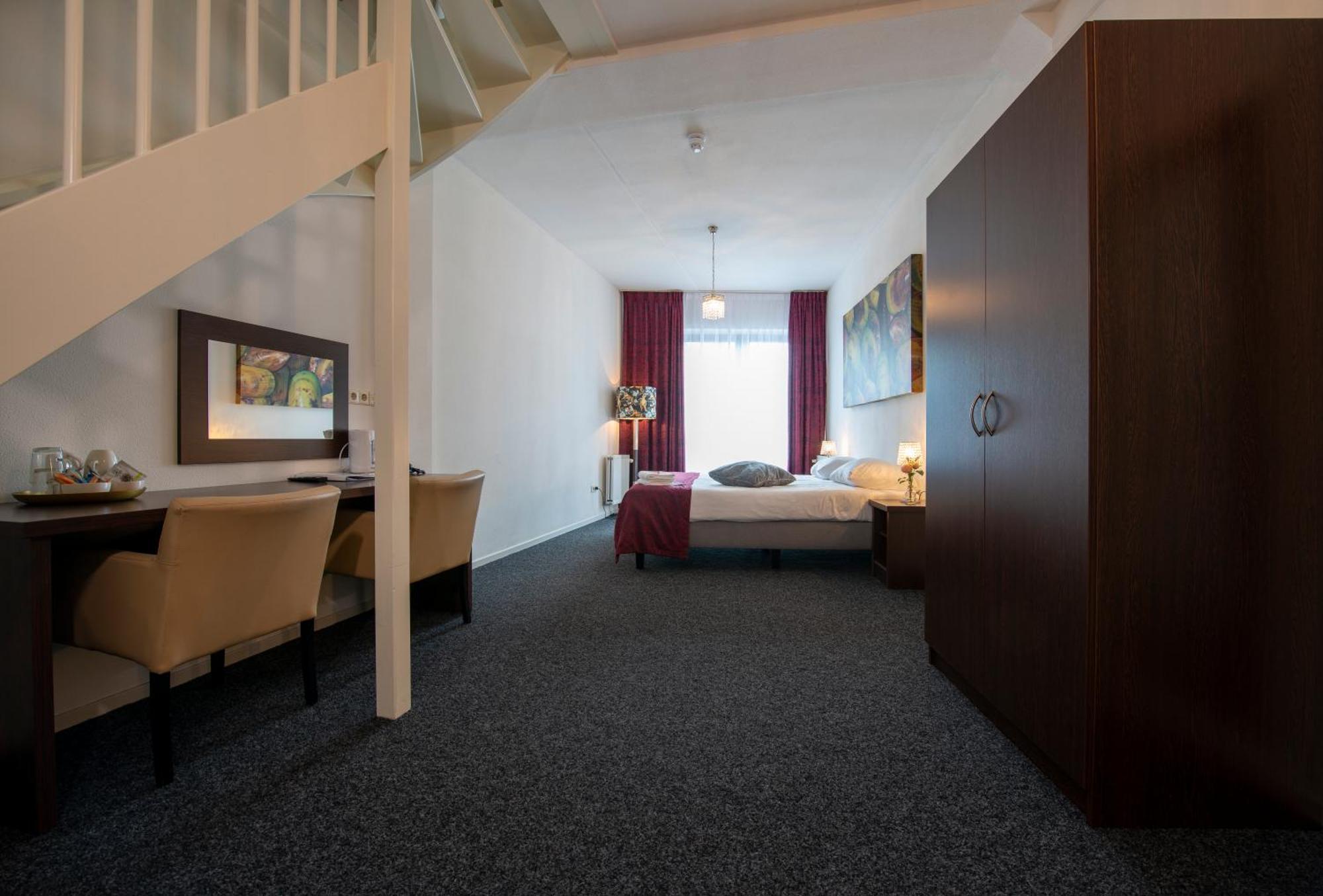 Hotel Arcen Habitación foto