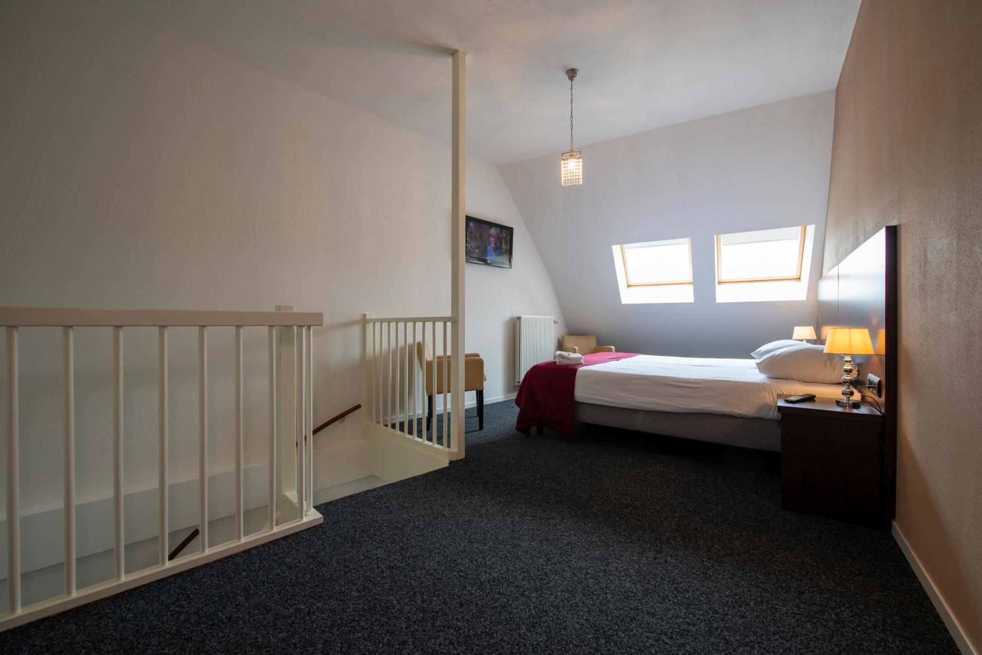 Hotel Arcen Habitación foto